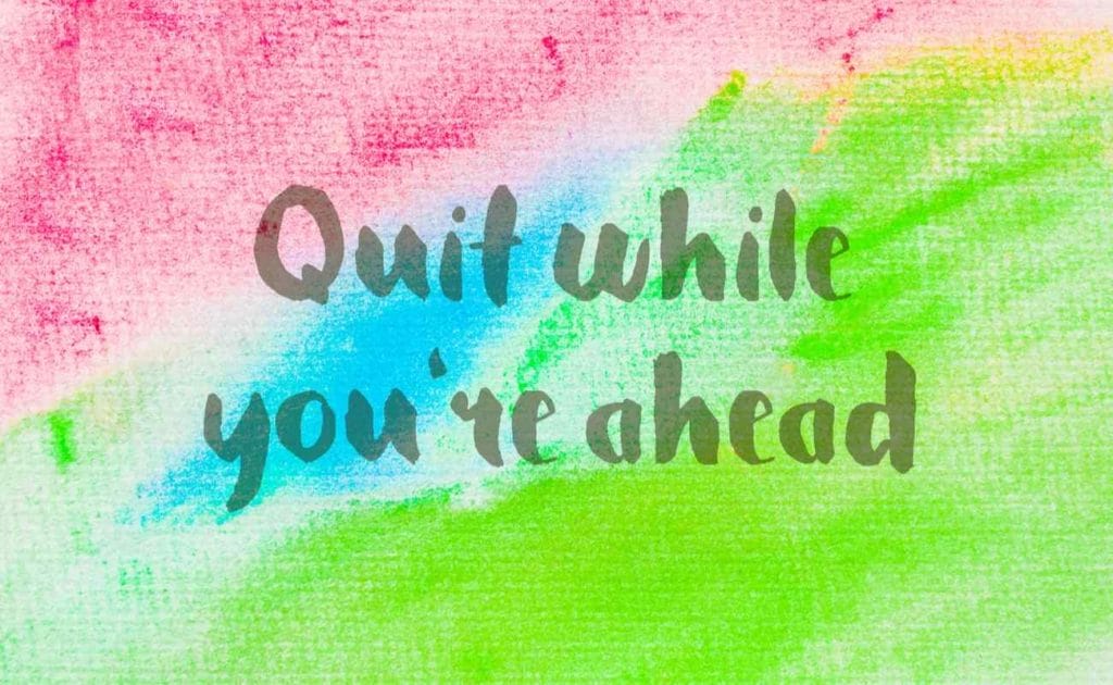 Quit while you're ahead, inspirational quote over an abstract watercolor textured background
