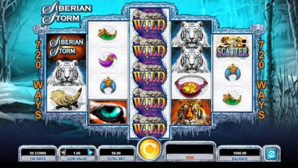 A screenshot of the Siberian Storm reels. Various wilds are visible on the reels, including the scatter symbol, wild symbols, and tiger symbols.