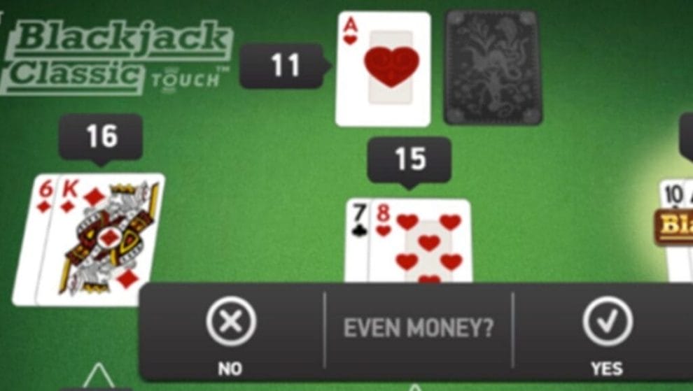 Blackjack Classic Touch played on a green felt table with playing cards.