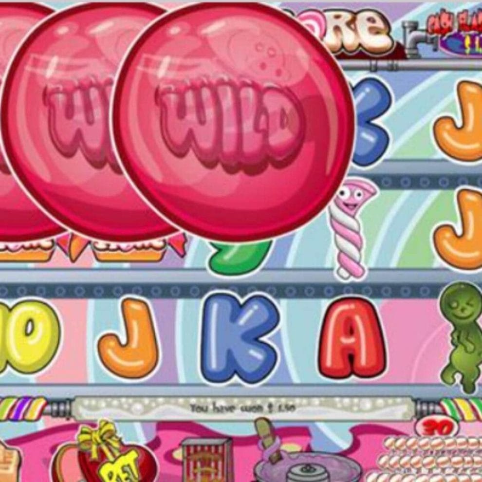 Candy Store slot game reels with big pink wild symbols, a marshmallow, a green gummy, and playing card symbols on colorful reels.