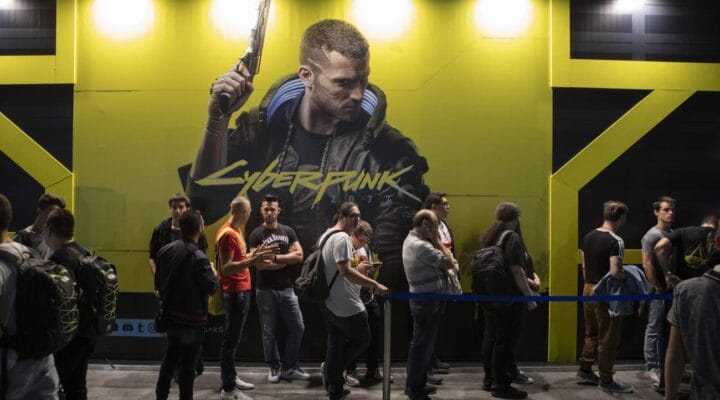 Fairgoers wait in line in front of Cyberpunk 2077's stand during the Milan Games Week September 2019