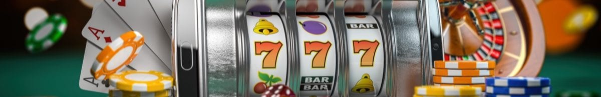 Three orange 7s lined up on a mobile online slots game, with chips, cards and a roulette wheel in the background.
