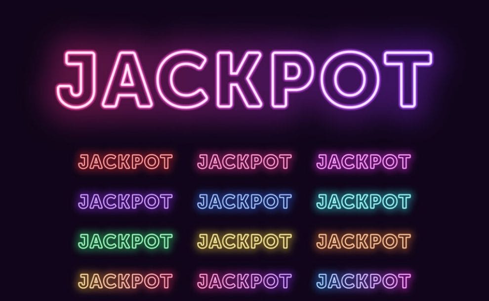The word Jackpot lit up in a neon purple sign.