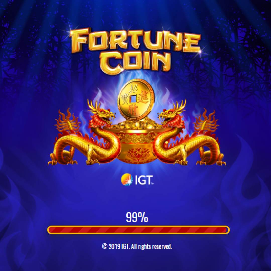 The loading screen for the Fortune Coin slot. The game logo is on a blue and black background and depicts two gold dragons on either side of a gold bowl filled with gold coins.