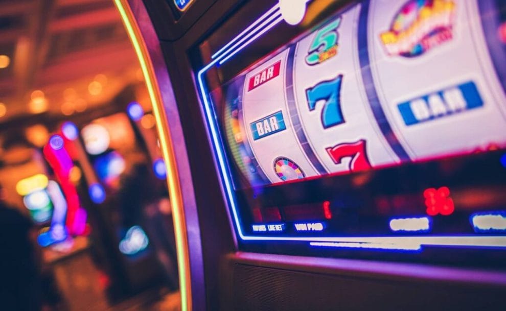 Header image of a brightly lit slot machine screen.