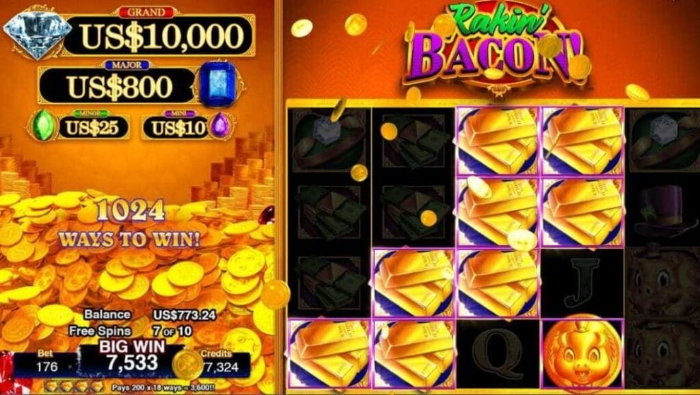 Rakin’ Bacon online slot by AGS showing a gold symbols.