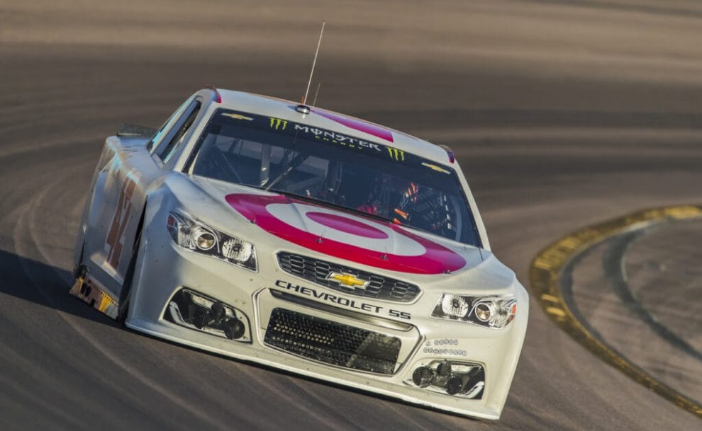 A Chevrolet car on the track in a NASCAR race.