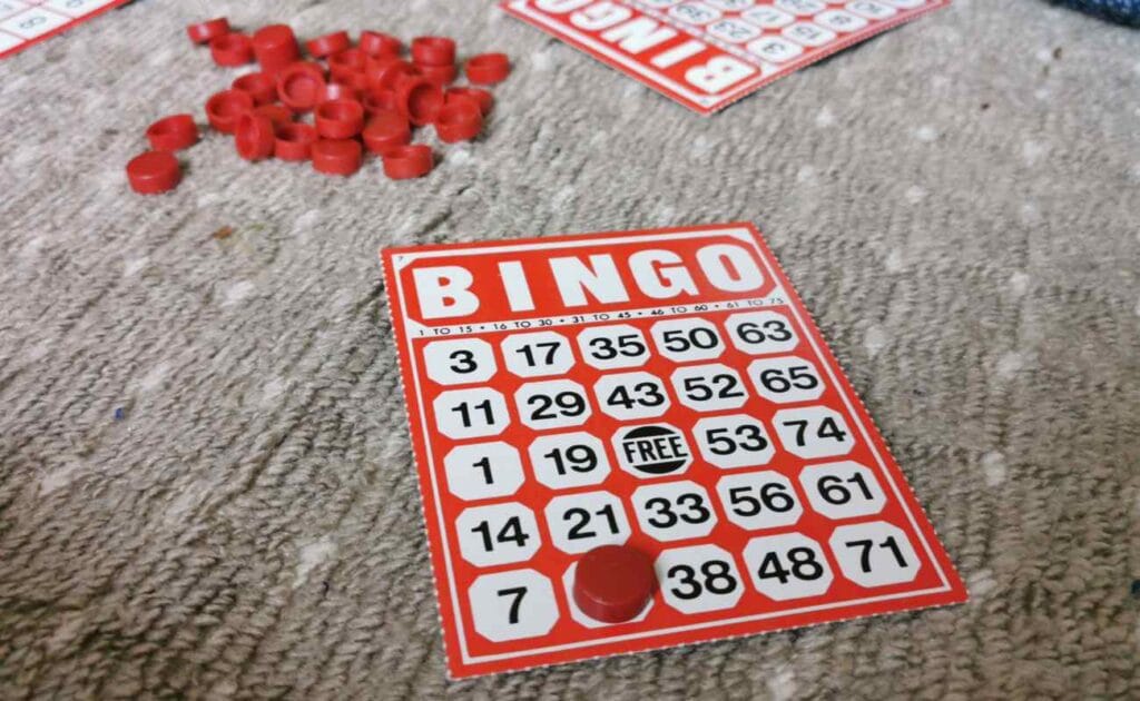 An American bingo card with bingo markers.