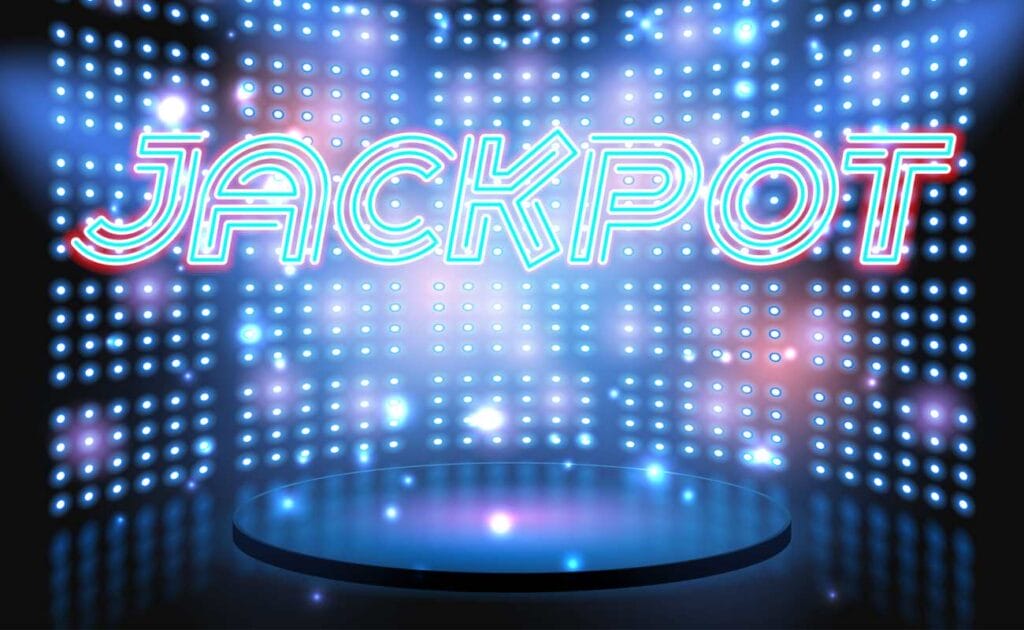 Game show stage with lights and the word ‘jackpot’ above it.