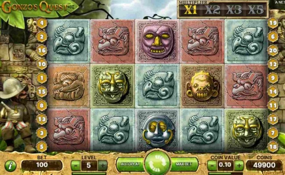 A screenshot of the carved stone symbols on the slot reels of Gonzo’s Quest.