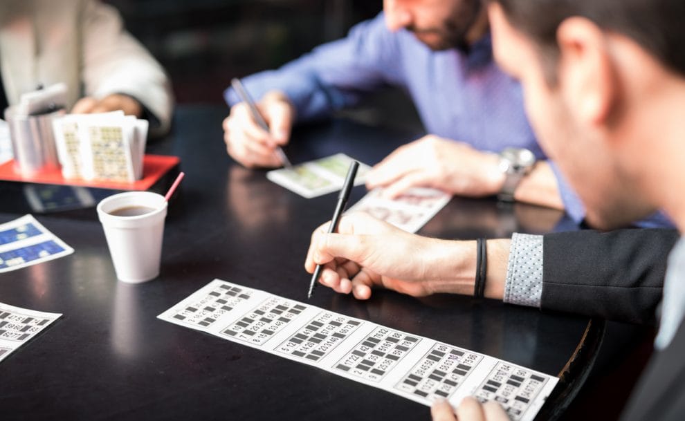 Players marking off bingo cards.