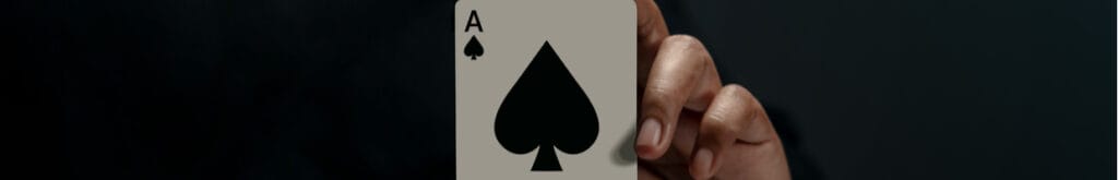 Ace playing card against a black background.