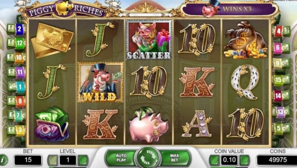 Screenshot of the reels in the Piggy Riches showing the wild and scatter symbols.