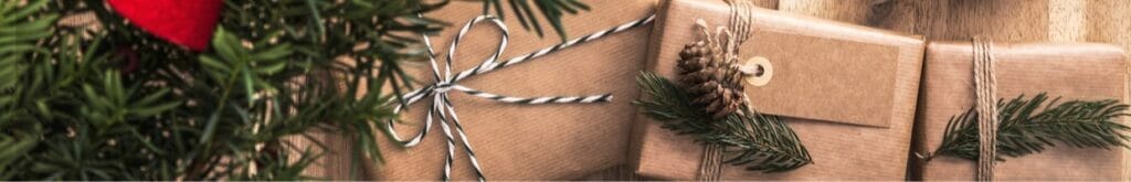 DIY-wrapped presents under a Christmas tree.