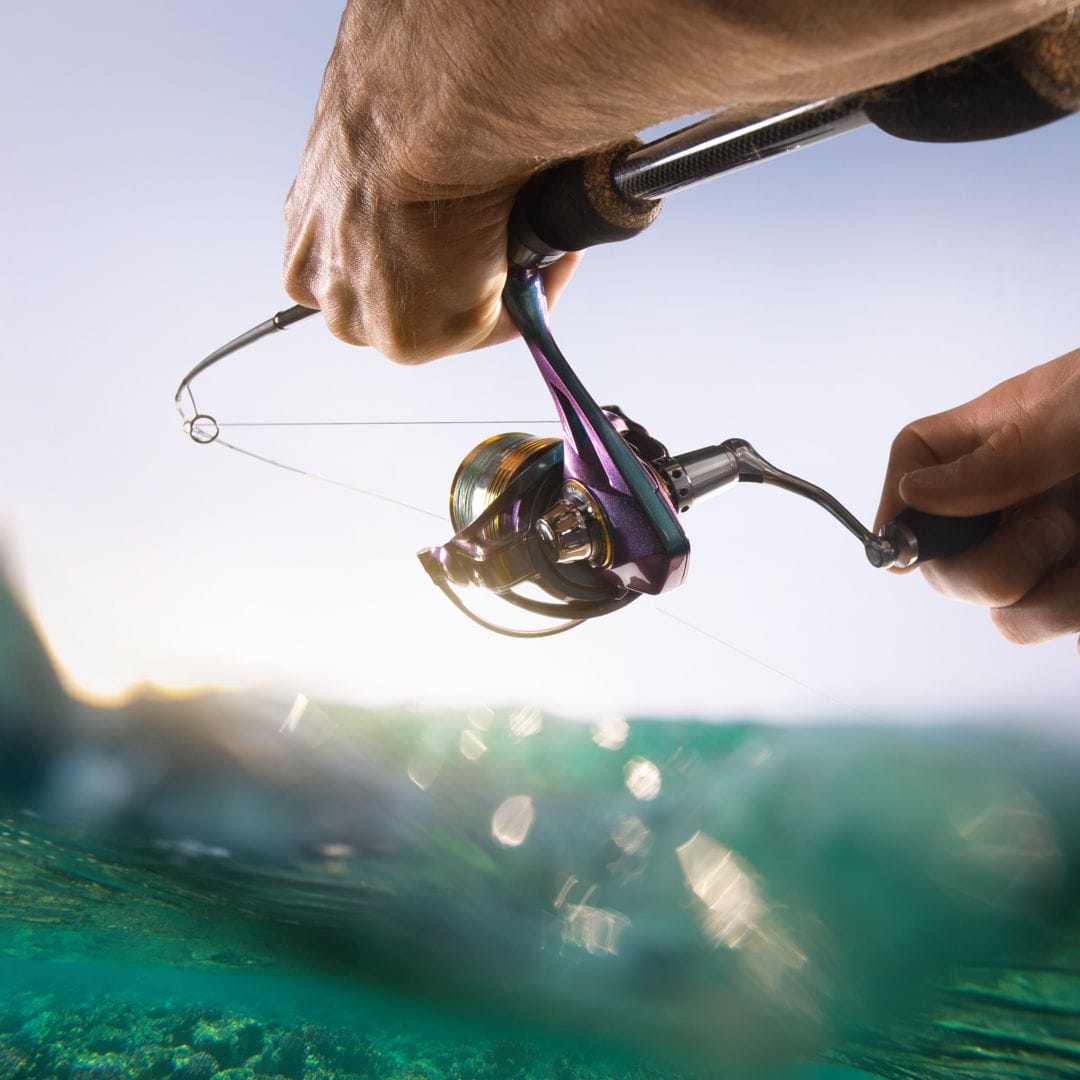 A close-up of a fishing reel.