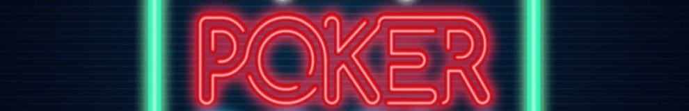 A red neon ‘poker’ sign on a wall.