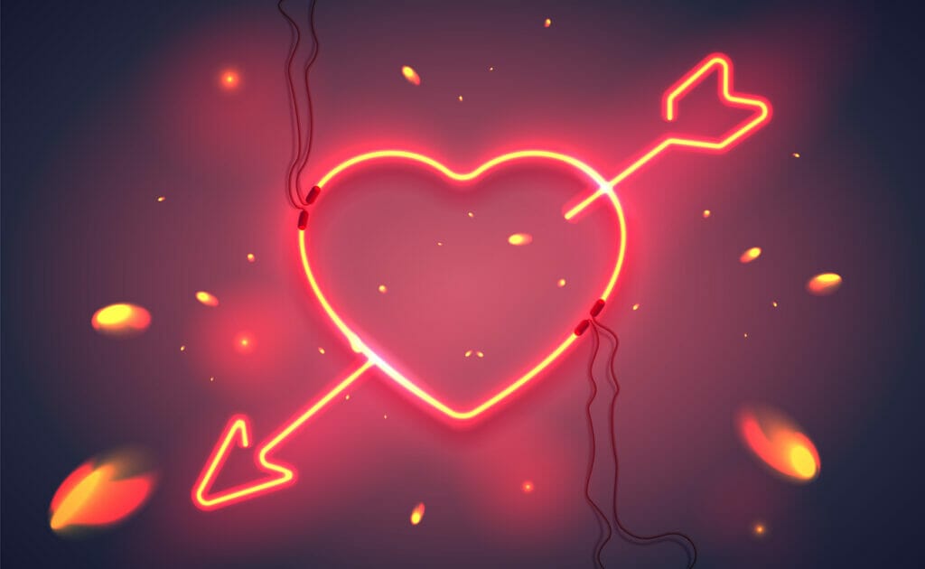  A neon heart and arrow sign.