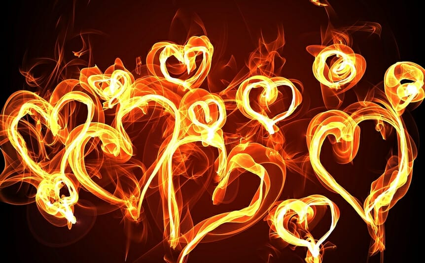 Fiery hearts against a dark background.
