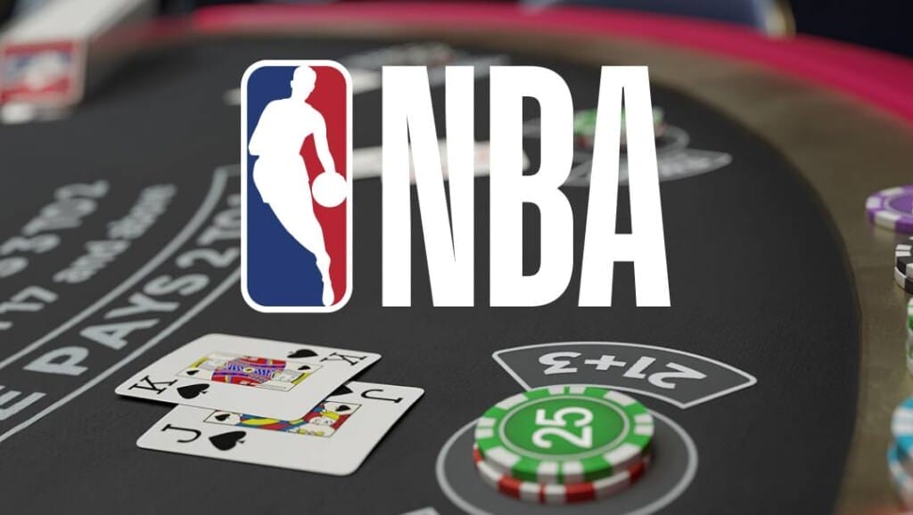 Layar judul NBA Blackjack. Ini fitur logo NBA di atas meja blackjack dengan taruhan 21+3 tunggal dan tangan blackjack senilai total 20.
