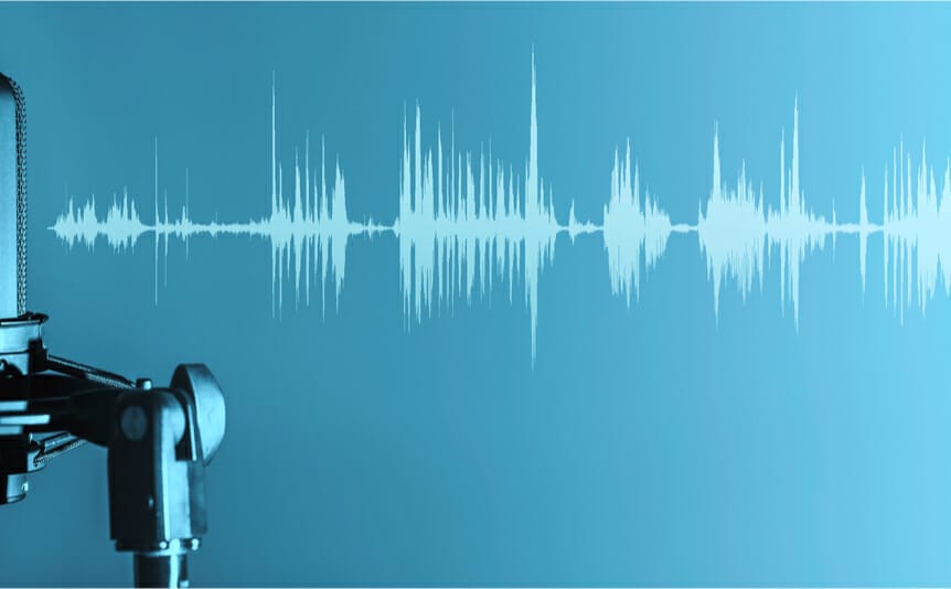 A professional microphone with sound waves on a blue background.