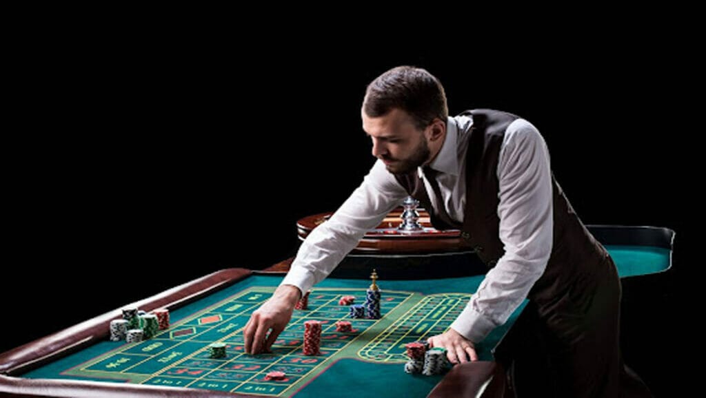 A croupier at a roulette table.