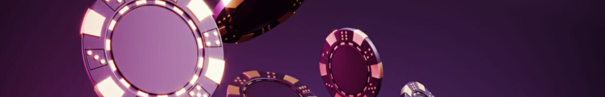 Purple casino chips against a purple background.