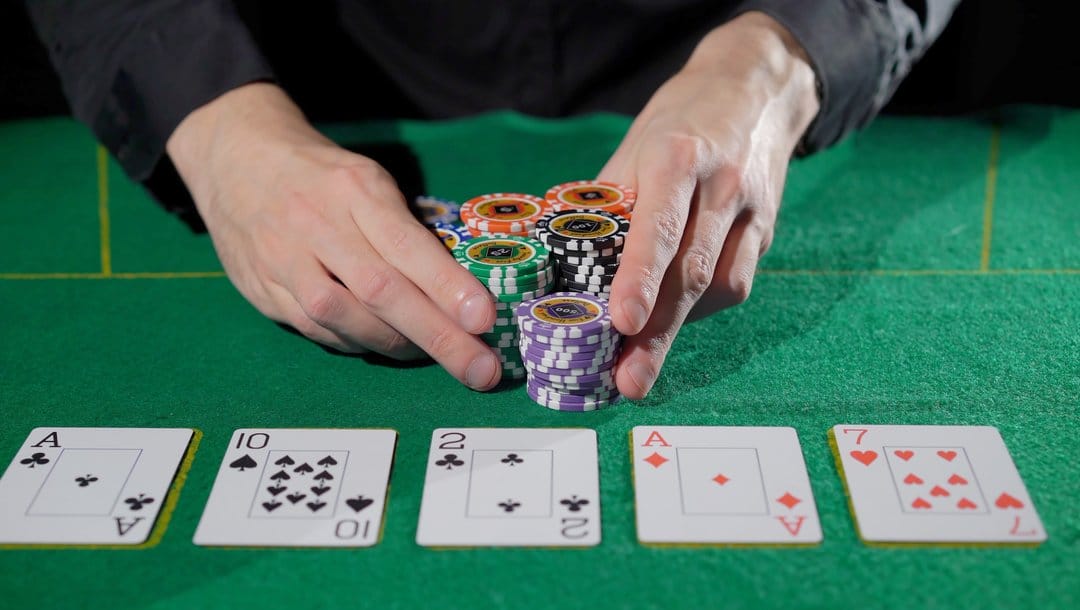 A poker player goes all in.
