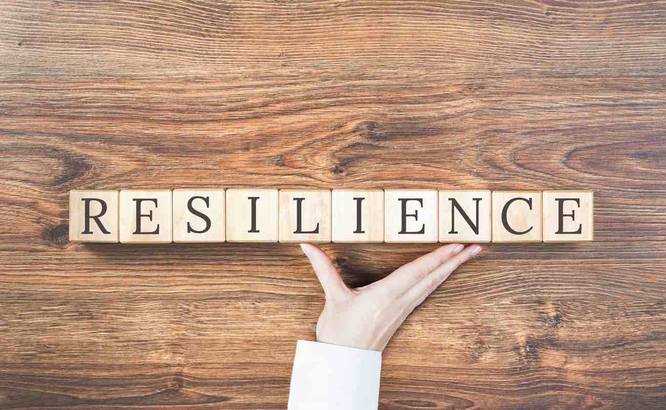 Text: “Resilience” written on wooden blocks.