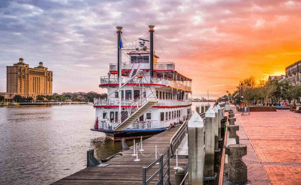 A riverboat moored at sunrise.