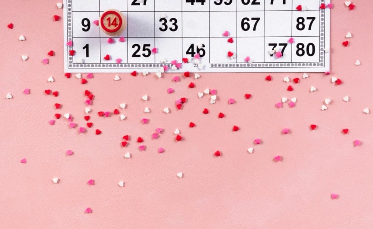  A bingo card on a pink background.