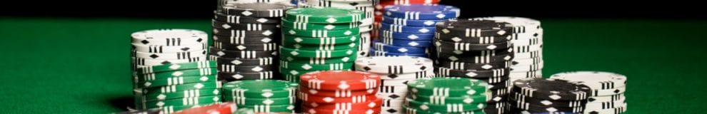 A stack of poker chips on a table.