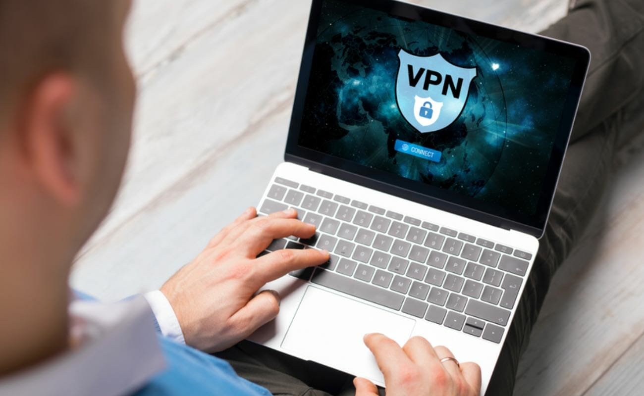 A man uses a VPN on his laptop.