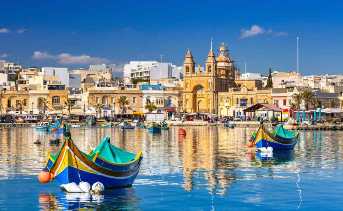 Traditional fishing boats in the Mediterranean Village of Marsaxlokk, Malta.