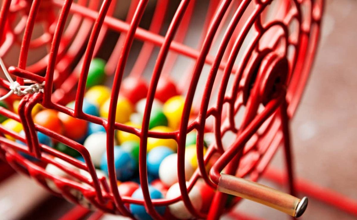 A cage of bingo balls.