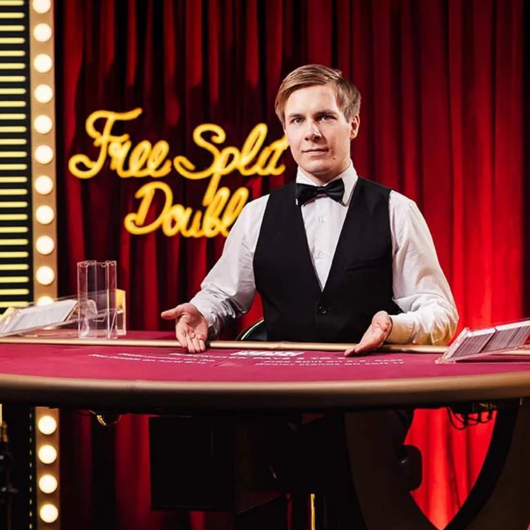 A live dealer in Free Bet Blackjack.