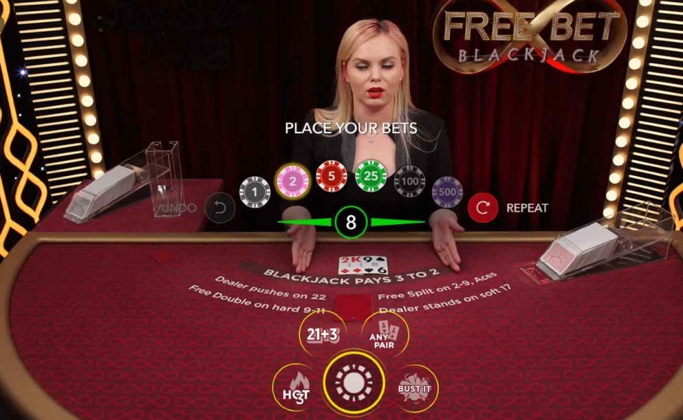 A dealer explains the game in Free Bet Blackjack.