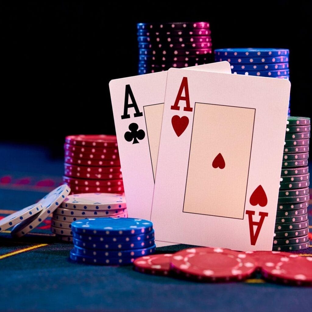 Header-A-pair-of-aces-leaning-against-stacks-of-poker-chips-Play-poker-1024x1024.jpg?lossy\u003d1\u0026ssl\u003d1