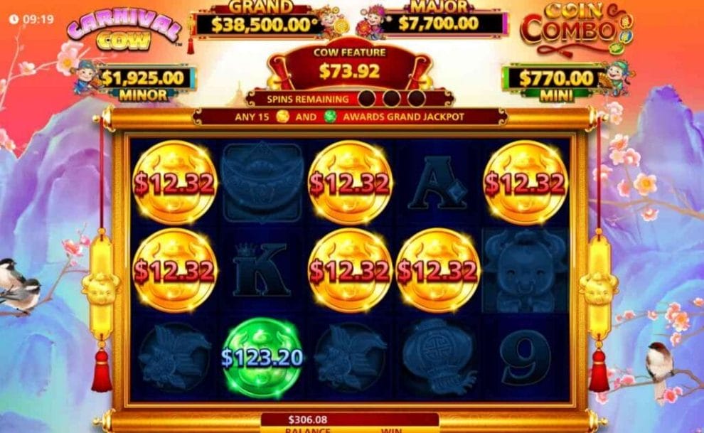 The game screen for the Cow feature on Carnival Cow Coin Combo shows six gold coins and one green coin on the reels. The reels are flanked by a cherry blossom tree with birds on the branches, and the background is a blue mountain range under a red sky.