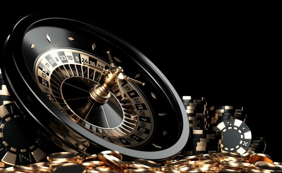 A roulette wheel surrounded by casino chips and gold coins.