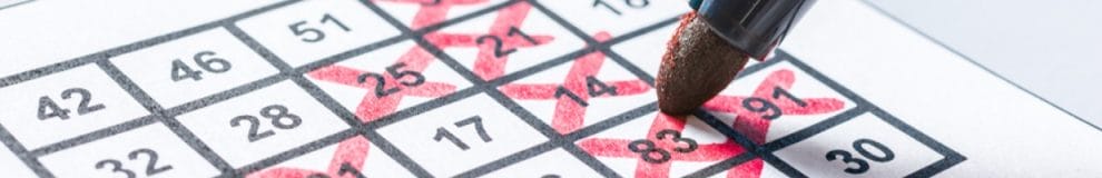 A pen marking out a bingo card.