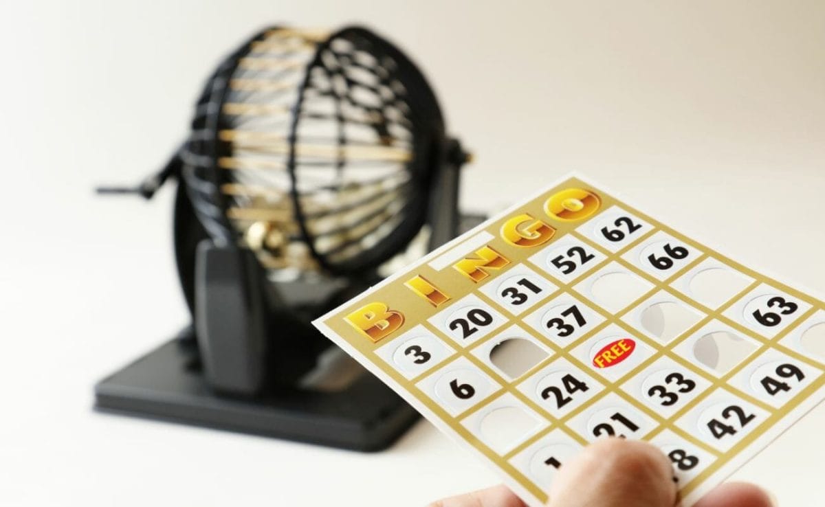 A bingo card with cage in the background.