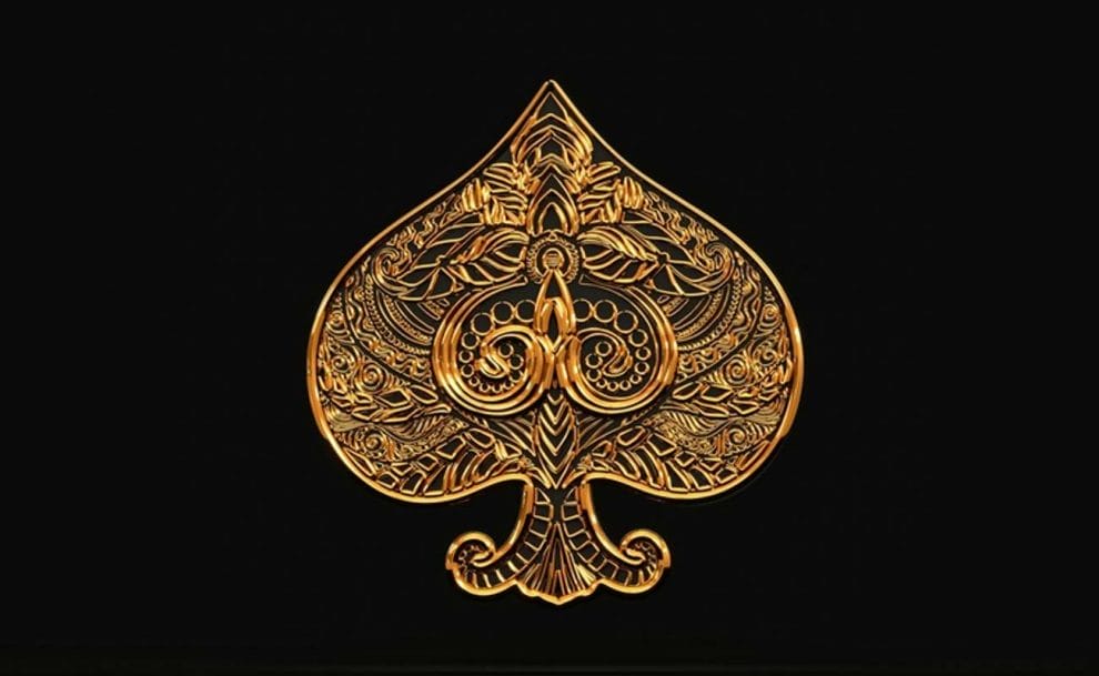  A gold ace of spades on a black background