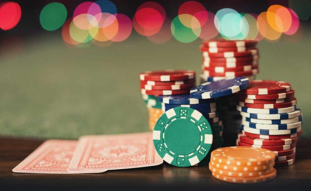 Two cards and chips on a table.