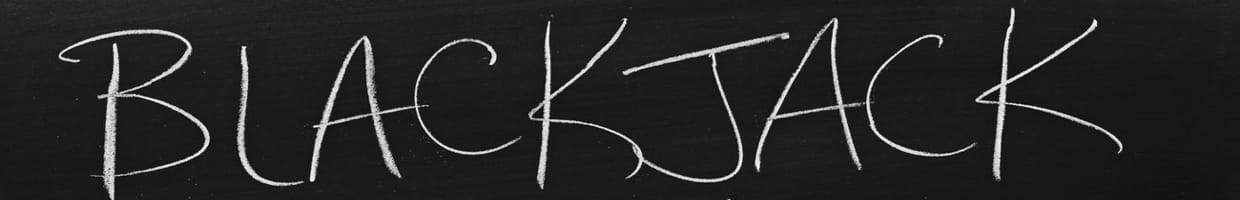 Blackjack 101 written on a blackboard with white chalk