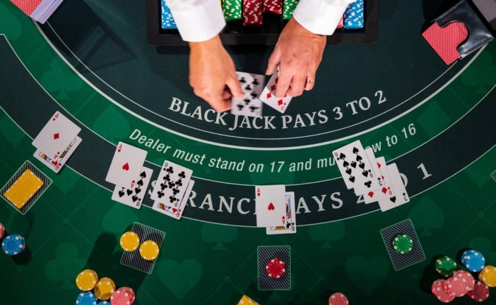 An aerial view of a blackjack game taking place.