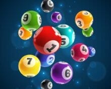 Various colored bingo balls floating against a blue background.