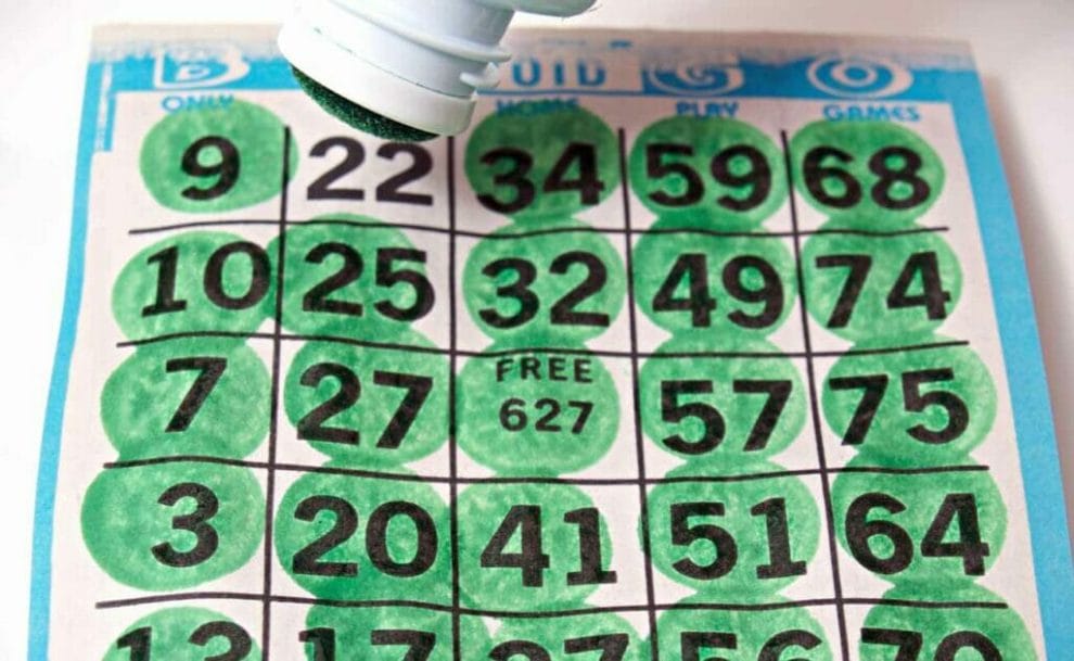 A bingo card with a green bingo dauber.