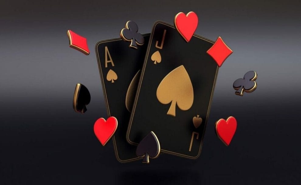Two black playing cards surrounded by floating card icons.
