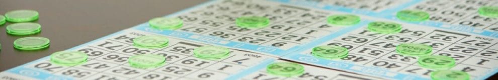 Bingo cards with transparent green chips.