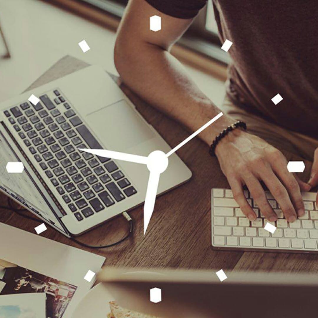 A man typing on a keyboard with a clock illustration.